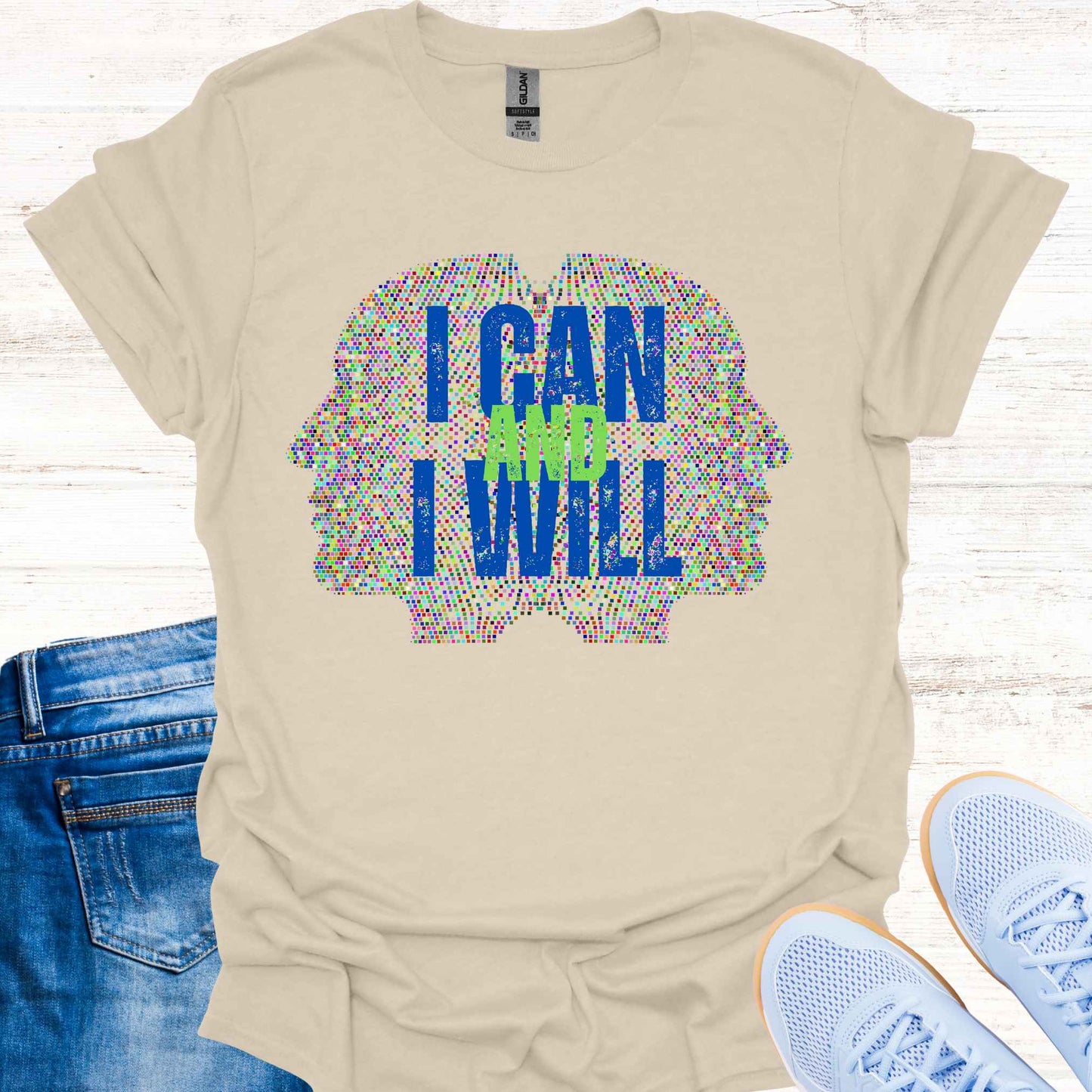 Natural t-shirt featuring a graphic of two side profiles of faces composed of many small dots, accompanied by the empowering phrase 'I Can and I Will.' This design inspires confidence, positivity, and self-belief, encouraging wearers to overcome challenges and embrace determination. Perfect for individuals seeking motivation and a reminder of their inner strength.