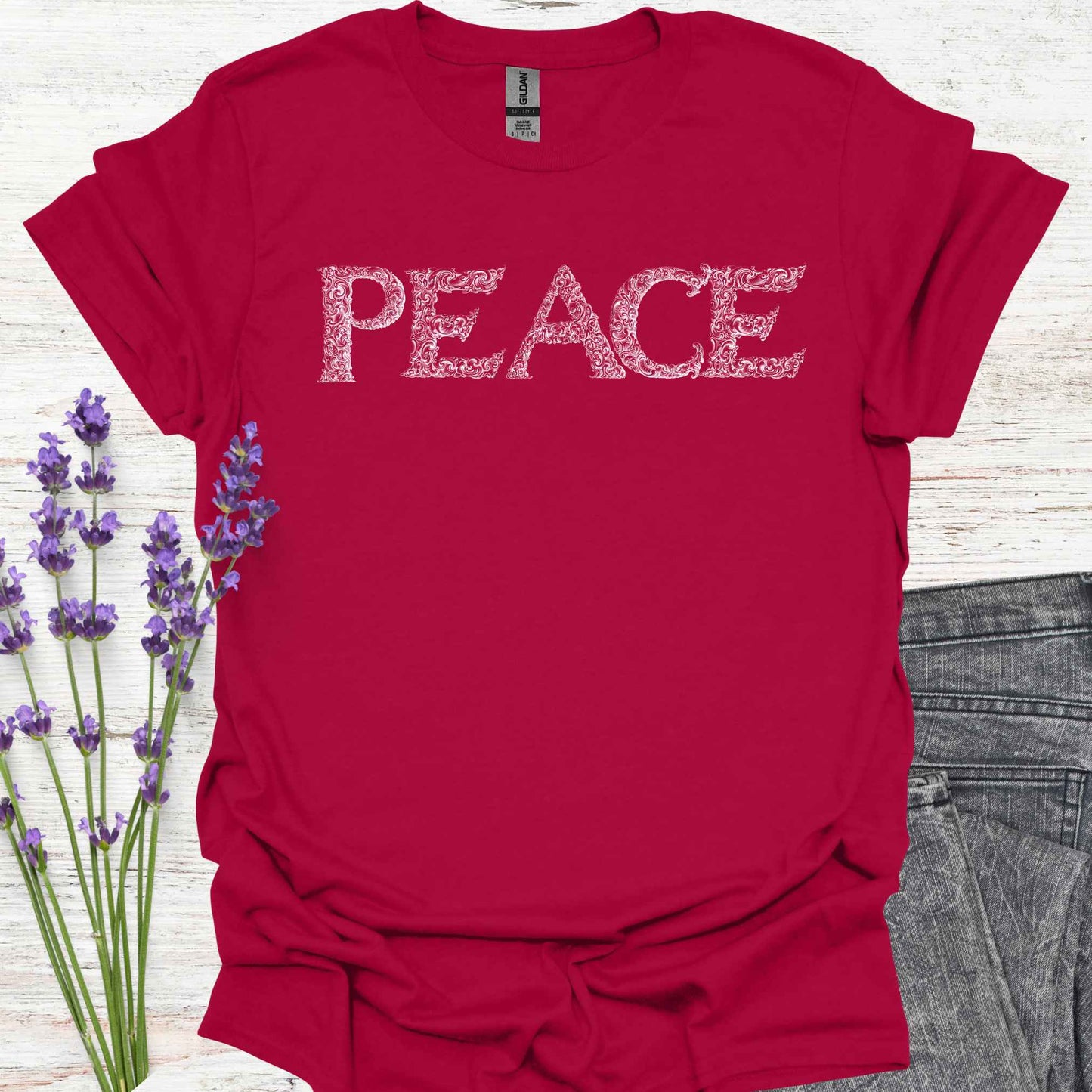 Peace t-shirt with stylized lettering of the word 'Peace' in a unique, artistic font. This design embodies the concept of inner peace, harmony, and tranquility. Perfect for those who value calmness, mindfulness, and positivity. A reminder to cultivate peace within and spread it to the world.